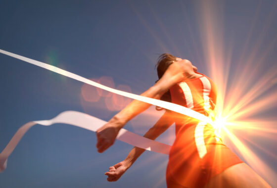 Woman crossing the finish line