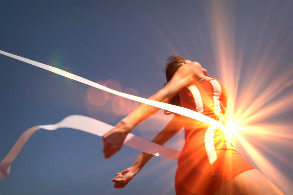 Woman crossing the finish line